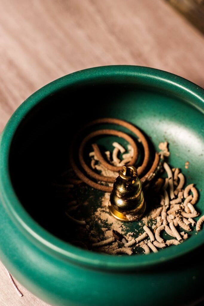 Mosquito Coil In a Green Bowl